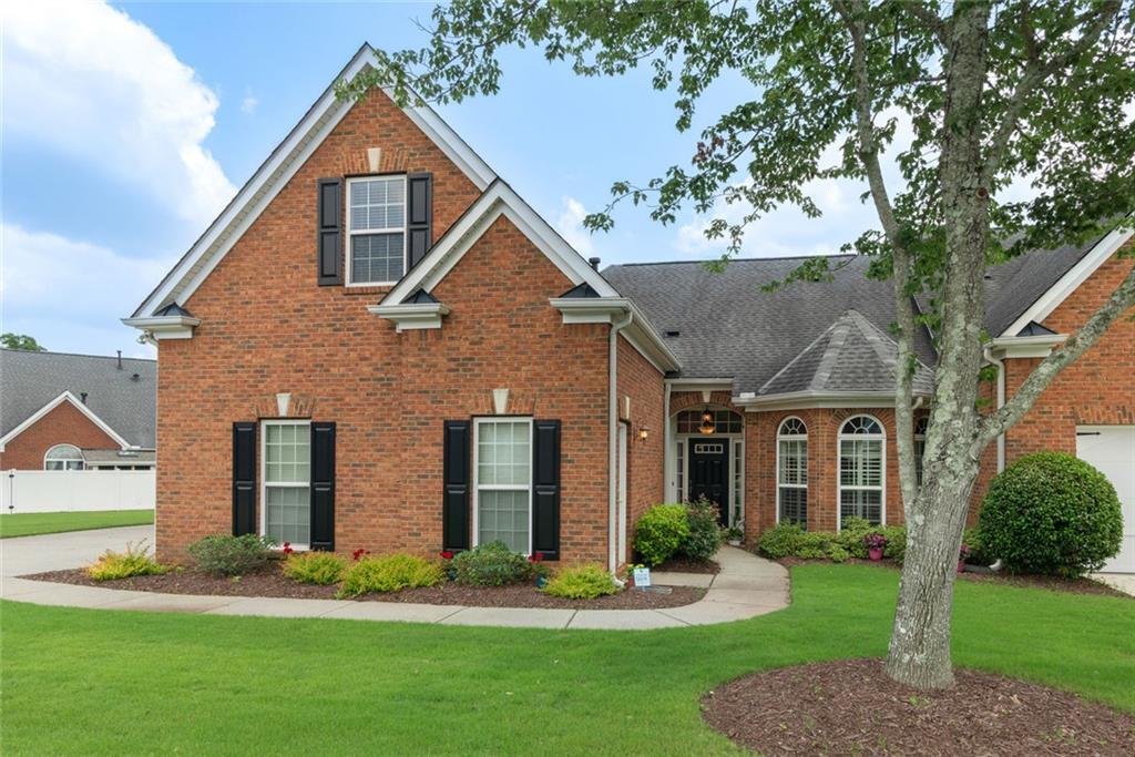 Photo one of 5250 Villa Lake Ct Suwanee GA 30024 | MLS 7589084F