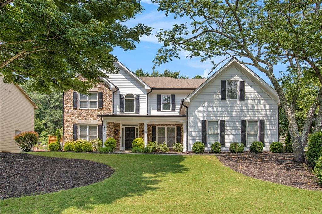 Photo one of 300 Windsor Chase Trl Johns Creek GA 30097 | MLS 7590280F