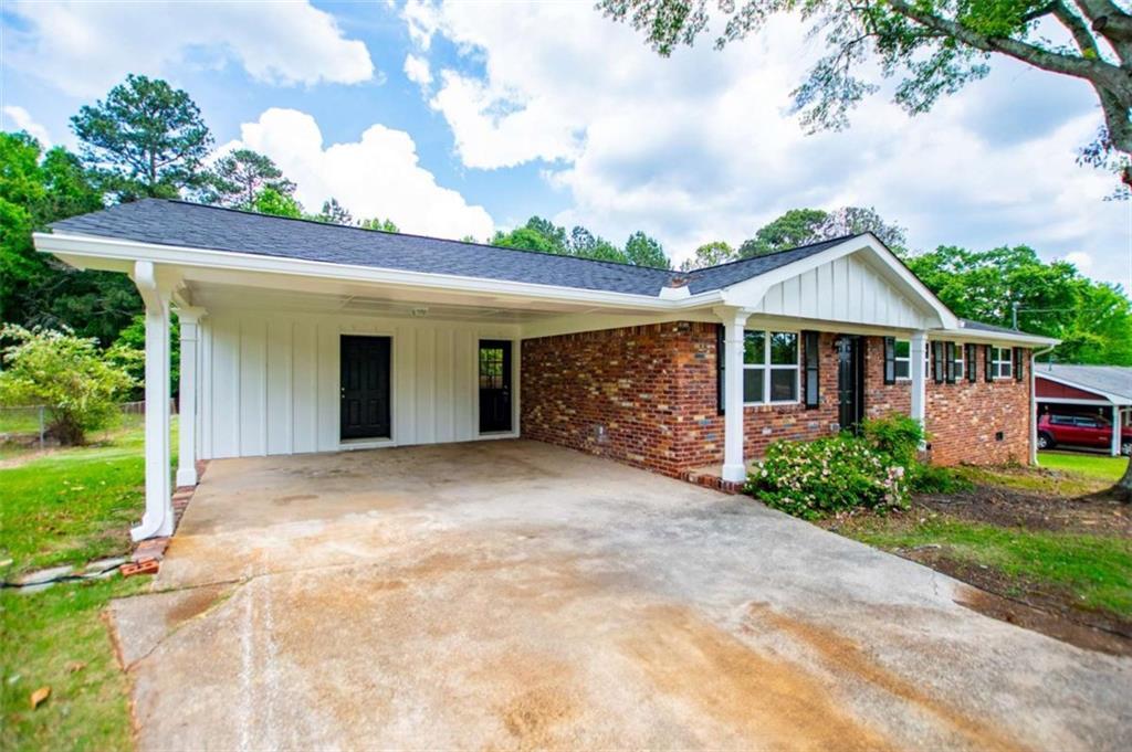 Photo one of 6213 Cherry Ln Douglasville GA 30134 | MLS 7592937F