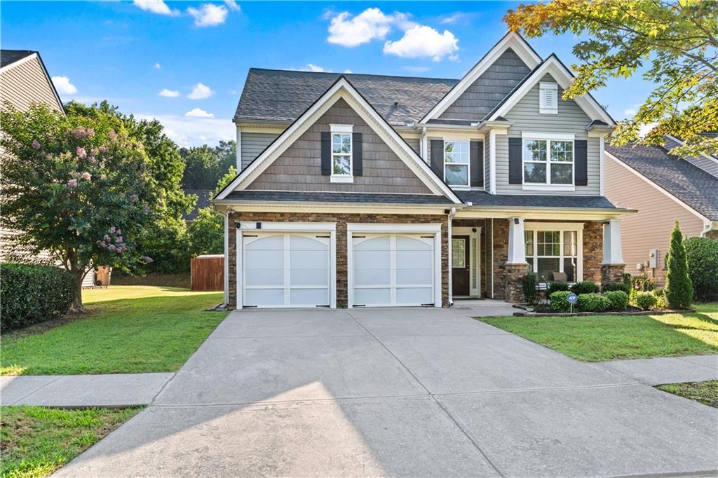 Photo one of 2481 Southhaven Ln Buford GA 30519 | MLS 7605363F