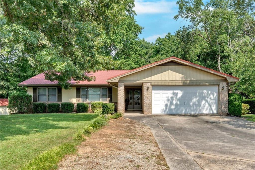 Photo one of 4866 S Lilburn Stone Mountain Road Sw Lilburn GA 30047 | MLS 7605443F