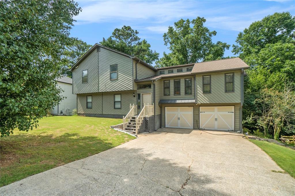 Photo one of 1105 Tom Lane Ln Marietta GA 30066 | MLS 7605916F
