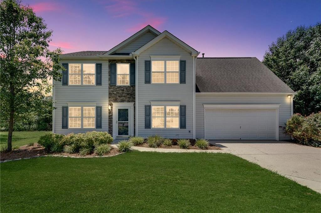 Photo one of 7550 Springmill Ct Cumming GA 30028 | MLS 7607846F