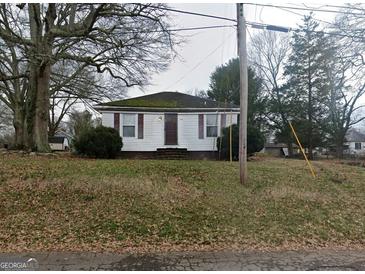 Cute ranch home with a spacious yard at 215 Sims St, Palmetto, GA 30268