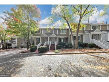 Charming townhome with well-maintained landscaping and a welcoming entrance at 6 Alston Ne Pl, Atlanta, GA 30324