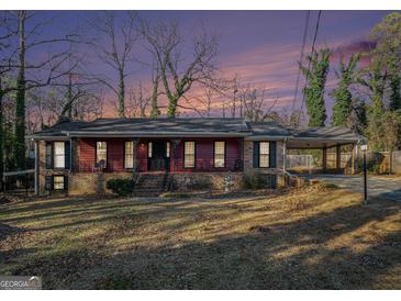 Ranch style home with brick facade and carport at 5546 Stoneybrook Se Ct, Mableton, GA 30126