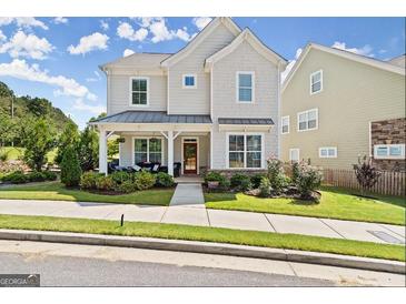 Two-story house with front porch and landscaped yard at 1977 Boyd Trace Nw Ln, Atlanta, GA 30318