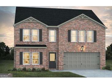 Two story brick home with gray garage door at 5324 Tolar Rd # 28, South Fulton, GA 30213