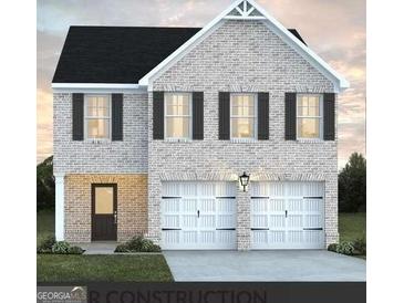 Two-story house with gray brick exterior, two-car garage, and dark shutters at 5335 Tolar Rd # 62, South Fulton, GA 30213