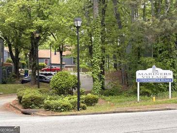 Condo building in Mariners Village community with parking at 1051 Mariners Ct, Stone Mountain, GA 30083