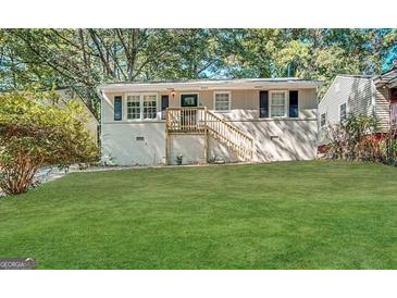 Updated Ranch home with new paint, steps, and landscaping at 490 Woods Dr, Atlanta, GA 30318