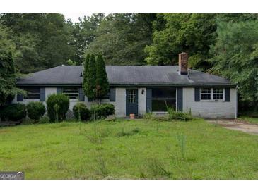 Ranch style home with a large yard at 1617 Corona Dr, Austell, GA 30168