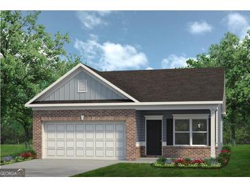 Brick ranch home with gray accents and a two-car garage at 1486 Trellis Court (Lot 43), Hampton, GA 30228
