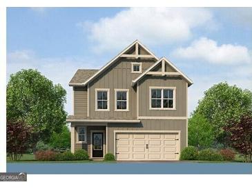 Charming two-story home featuring board and batten siding, a two-car garage, and inviting curb appeal at 1234 Riverstone Rd, Jonesboro, GA 30238