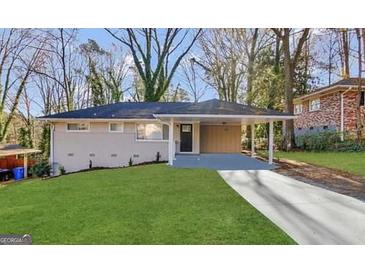 Charming single-story home with a covered carport and freshly painted exterior at 2740 Bonnybrooke, Atlanta, GA 30311