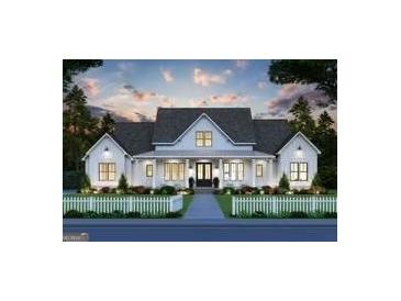 Inviting two-story modern farmhouse with charming front porch and white picket fence and lush landscaping at 0 Lot 2 Mcbride Rd, Fayetteville, GA 30215