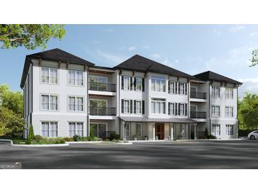 Beautiful condo complex featuring three stories, private balconies, and manicured landscaping at 1000 Blair Ln # 302, Peachtree City, GA 30269