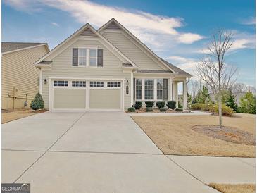 Charming single-Gathering home with a two-car garage, well-manicured lawn, and inviting curb appeal at 339 Cottonwood Cir, Peachtree City, GA 30269