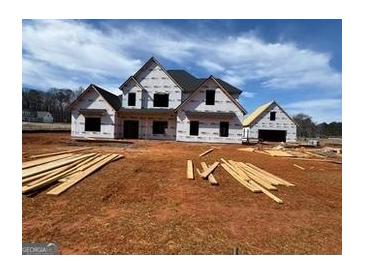 Two-story home under construction with a charming design, showcasing its potential at 454 Snead Road # 3, Fayetteville, GA 30215