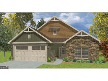 Charming craftsman-style home with stone accents, inviting curb appeal, and a two-car garage at 11144 Cornerstone Way, Hampton, GA 30228