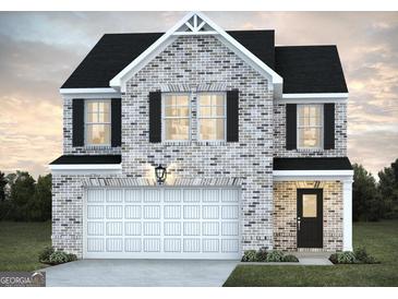 Charming two-story home featuring gray brick, black shutters, and an attached two-car garage at 5364 Tolar Road # 74, South Fulton, GA 30213