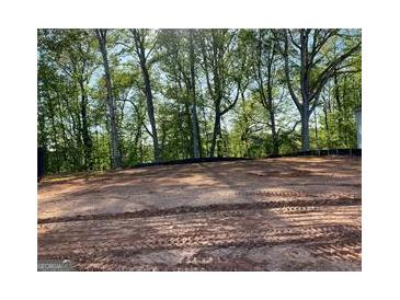 Cleared lot for new construction with a wood line at 4678 Glore Sw Rd, Mableton, GA 30126