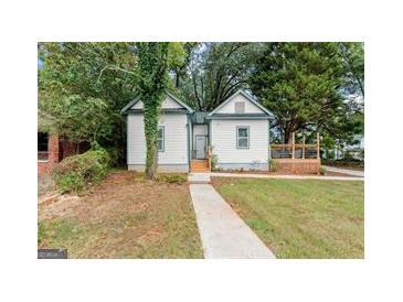 Charming home with a well-maintained front yard and inviting walkway at 690 Mcdonough Se Blvd, Atlanta, GA 30315
