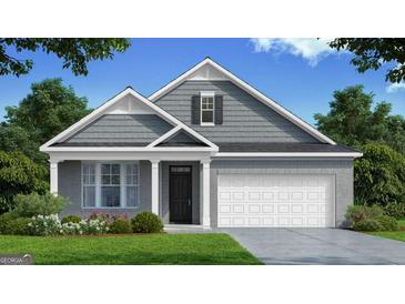 Charming single-story home featuring a brick facade, covered porch, and a two-car garage at 737 Myrica Ave, Locust Grove, GA 30248