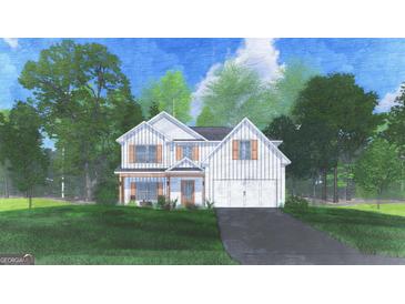 Charming two-story home with a classic design, featuring a welcoming porch and an attached garage at 623 Bohannon Rd # 4, Grantville, GA 30220