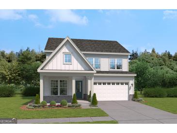 Charming two-story home featuring a two-car garage, landscaped yard and Craftsman-style architecture at 602 Belshire Dr, Acworth, GA 30102