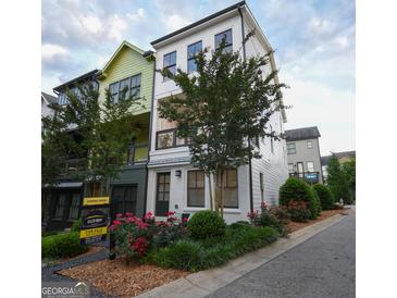 Attractive multi-level home with landscaped yard and inviting curb appeal, creating a welcoming first impression at 756 Cady Way, Atlanta, GA 30312