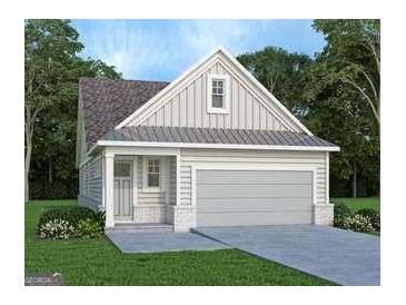 Charming single-Gathering home with a gray two-car garage, complemented by manicured landscaping and a cozy front porch at 1818 Butterfly Way, Marietta, GA 30066