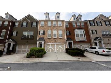 Charming townhomes with well-maintained front yards and garages in a desirable neighborhood at 6089 Indian Wood Cir, Mableton, GA 30126
