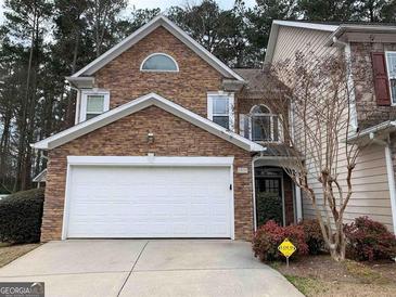 Charming two-story home featuring a stone facade and a two-car garage at 2804 Dominion Nw Ln # Bldg 2, Kennesaw, GA 30144