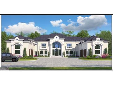 Elegant home with a circular driveway, manicured landscaping, and a striking architectural design at 4309 Giverny Blvd, Fairburn, GA 30213