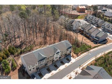 New townhome community near wooded area, featuring modern architecture and convenient street access at 234 Retreat Ln, Canton, GA 30114