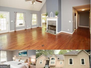 Spacious living room featuring a fireplace, vaulted ceilings, and hardwood floors at 1252 Heritage Dr, Villa Rica, GA 30180