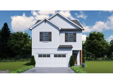 Charming two-story home featuring a white exterior, black shutters, a two-car garage, and well-maintained landscaping at 4454 Eastbrook Pl # 57B, Snellville, GA 30039
