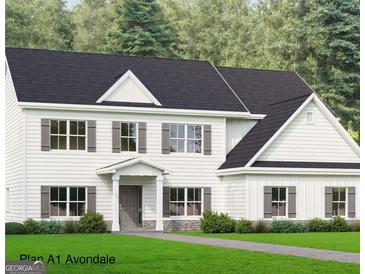 New construction home featuring a charming two-story with gray shutters and stone foundation at 115 Seymour Place, Fayetteville, GA 30214
