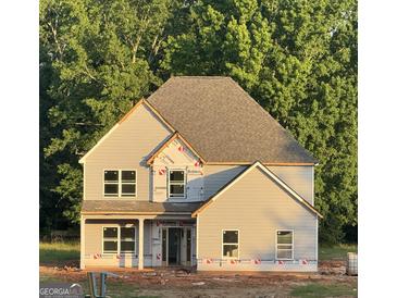 New construction two-story home with gray siding and a partially landscaped yard offers a great opportunity at 68 Maddox Road, Mcdonough, GA 30252