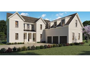 New construction, white, 2-story home featuring a 3-car garage and nicely landscaped yard at 2517 Canopy Ct, Marietta, GA 30066