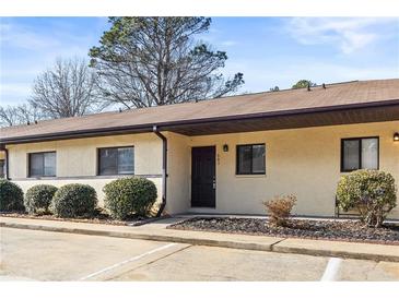 Charming condo building with well-maintained landscaping and parking at 803 New Horizon St, Powder Springs, GA 30127