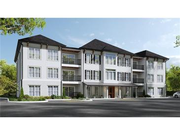 Two-story building with white siding, black shutters, and a covered entrance at 1000 Blair Ln # 1, Peachtree City, GA 30269