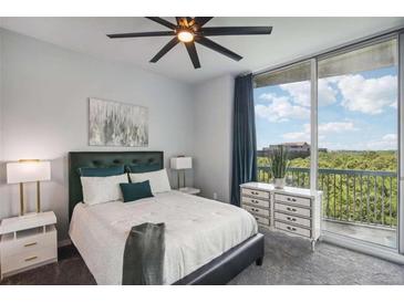 Bright bedroom with city view, large bed, and modern decor at 3300 Windy Ridge Se Pkwy # 813, Atlanta, GA 30339