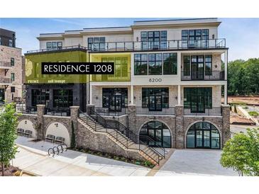 Attractive three-story condo building with outdoor terraces and street-level storefronts at 8200 Main S St # 1208, Woodstock, GA 30188
