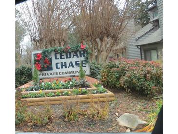 Cedar Chase private community entrance sign with festive holiday decor at 102 Cedar Chase Rd, Atlanta, GA 30324