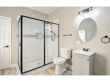 Modern bathroom with a large shower and updated vanity at 1581 Linda Sw Way, Atlanta, GA 30310