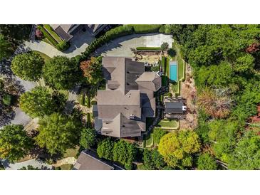 Stunning aerial view of the estate showcasing the pool, landscaping, and architectural design at 980 Fenimore Cir, Sandy Springs, GA 30350