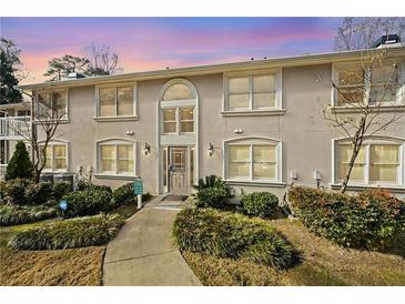 Charming condo exterior with well-maintained landscaping and a beautiful entrance at 1538 Chantilly Ne Dr # 224, Atlanta, GA 30324