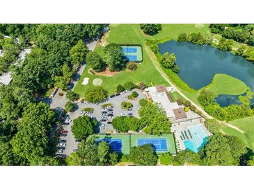 Aerial view of community features including tennis courts, pool, and clubhouse at 10 Chaumont Nw Sq, Atlanta, GA 30327